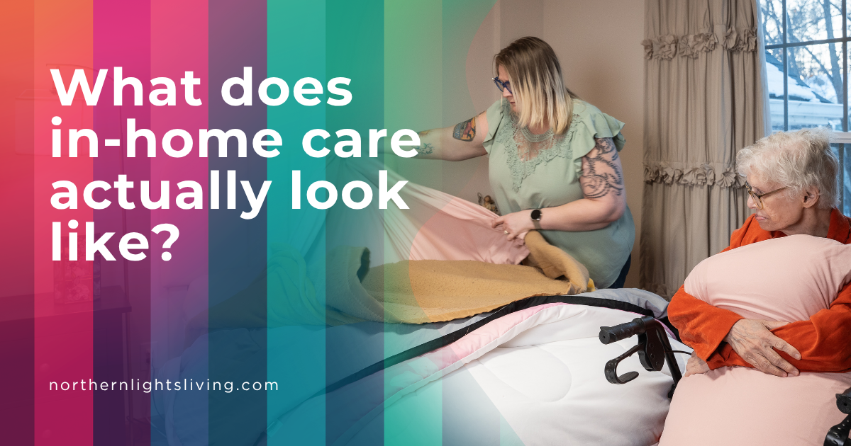 A female caregiver provides in-home care services by assisting a senior woman with making her bed.
