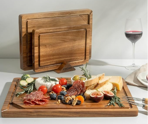 Wood cutting board with fresh vegetables — non-toxic alternative to plastic cutting boards
