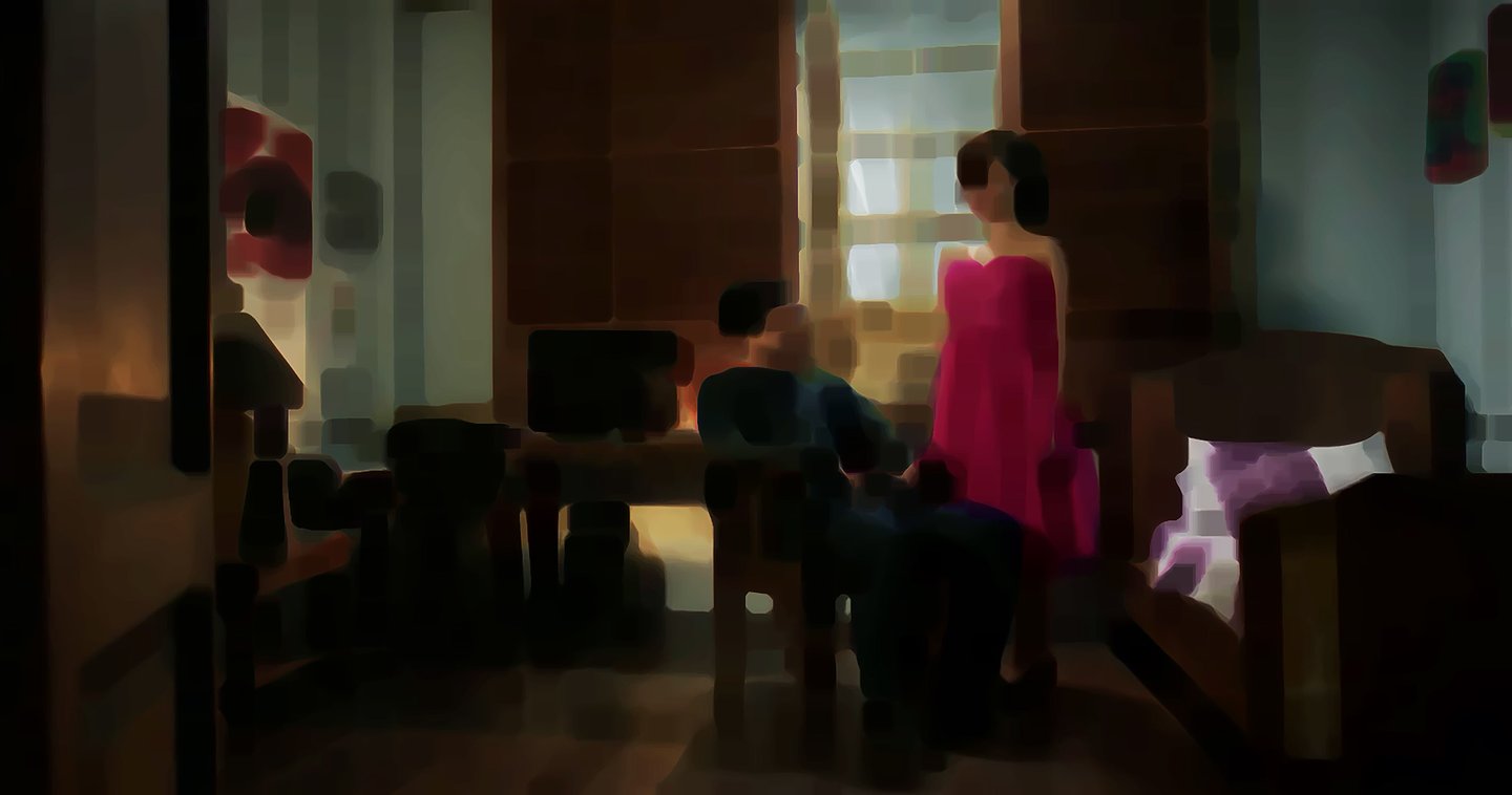 a woman in a pink dress standing in front of a mirror