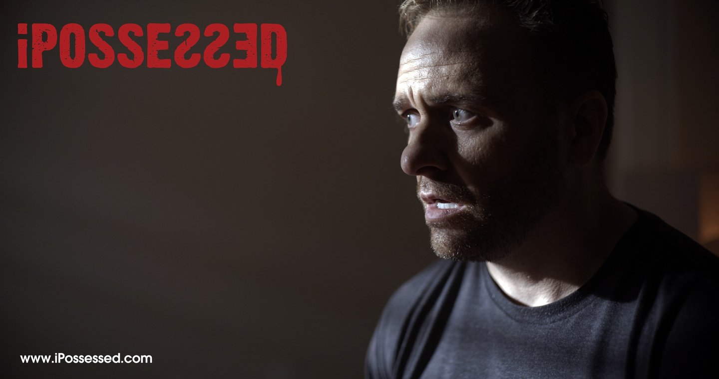 a man with a beard and a black shirt