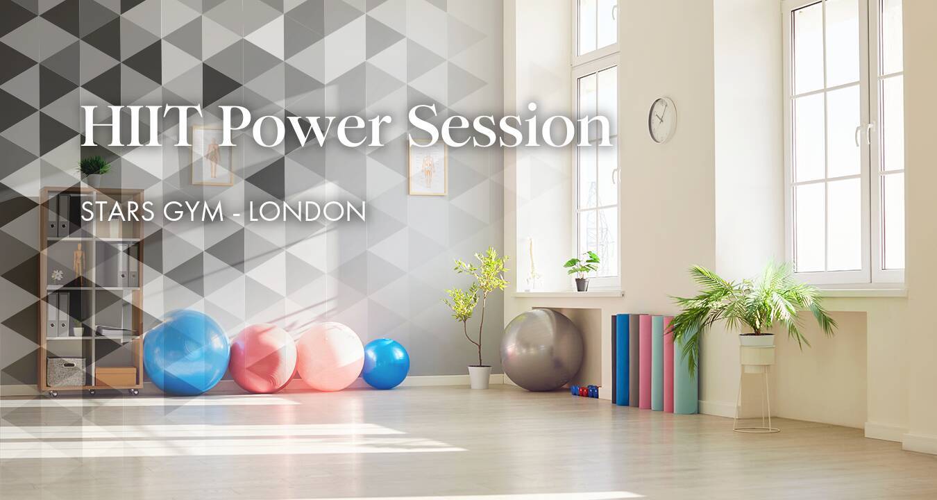 Modern HIIT power session fitness studio at Stars Gym London with yoga mats and stability balls.