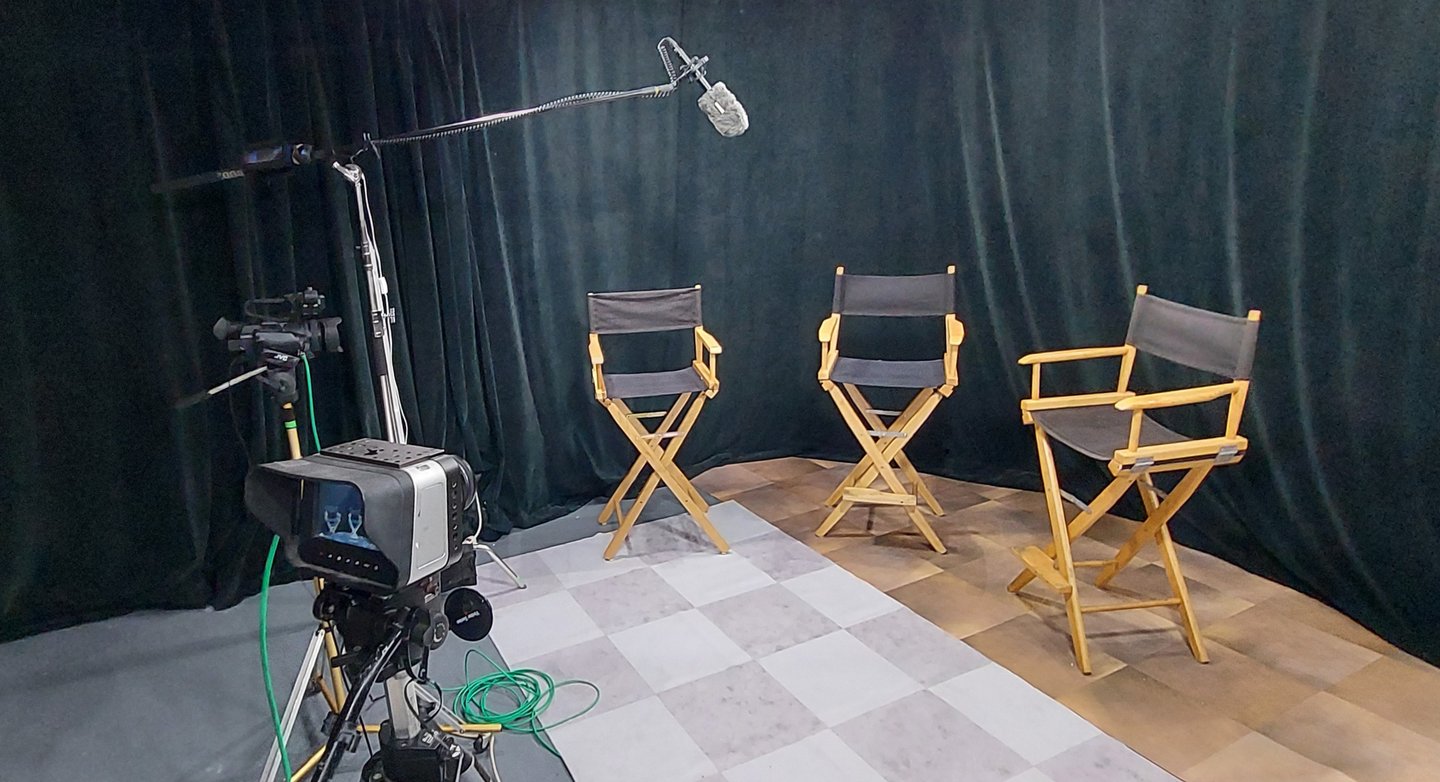 Simple black curtain with 3 Director's Chairs