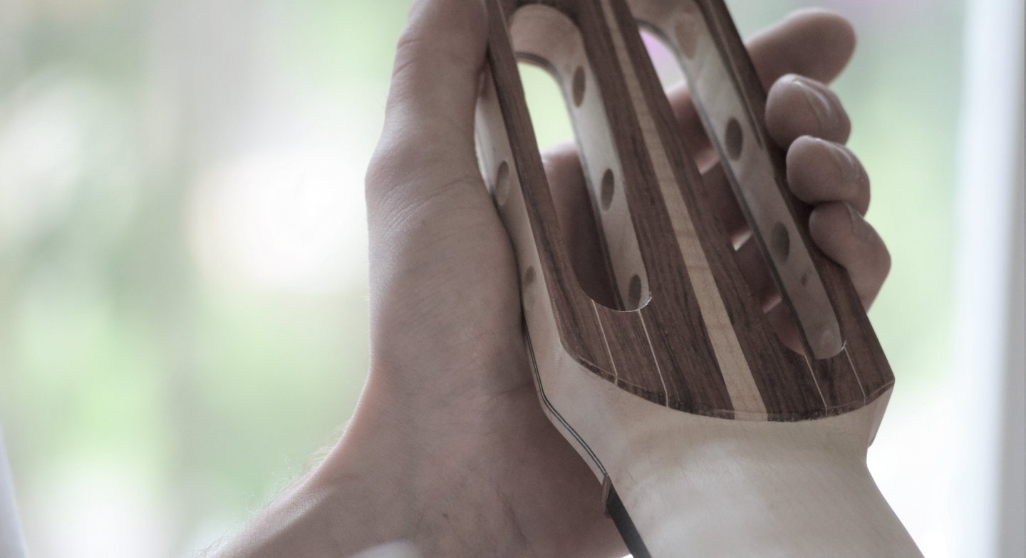 7-strings guitar head stock being made 