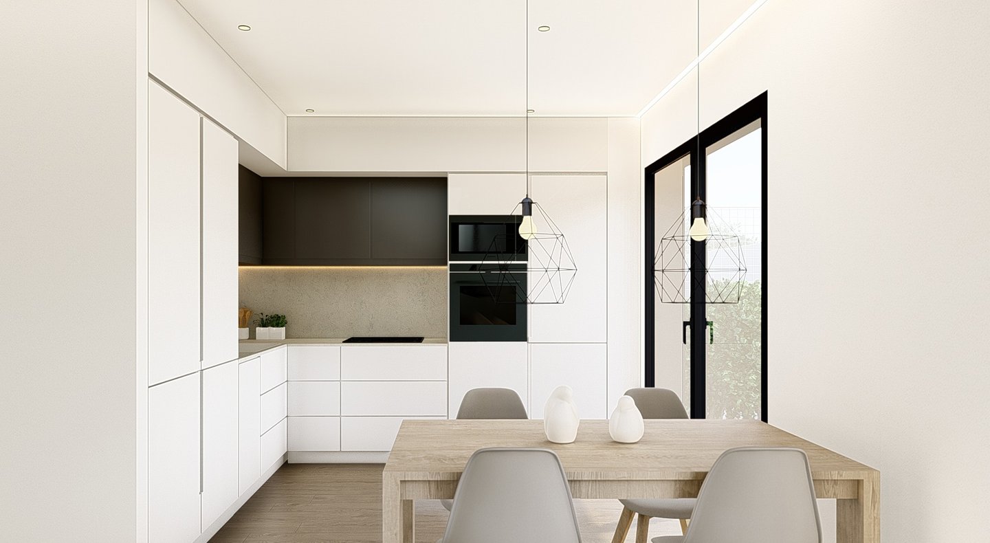 a kitchen with a table and chairs and a table