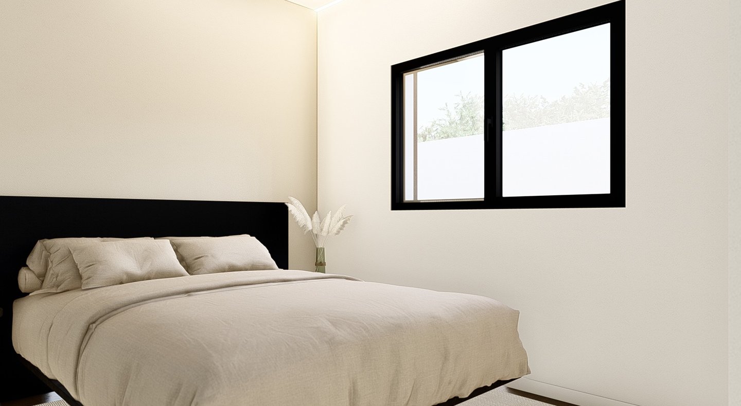 a bed with a bed and a table with a lamp