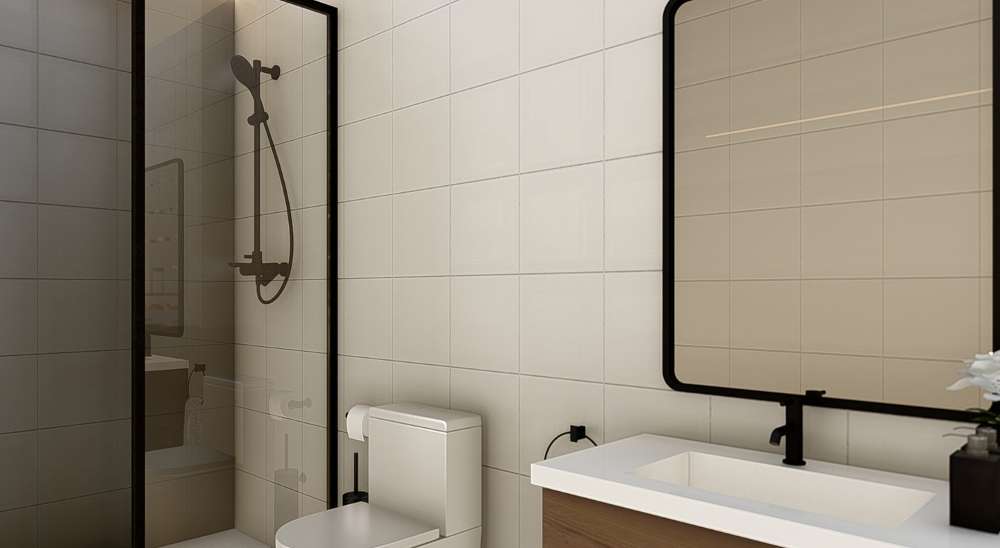 a bathroom with a toilet and a shower