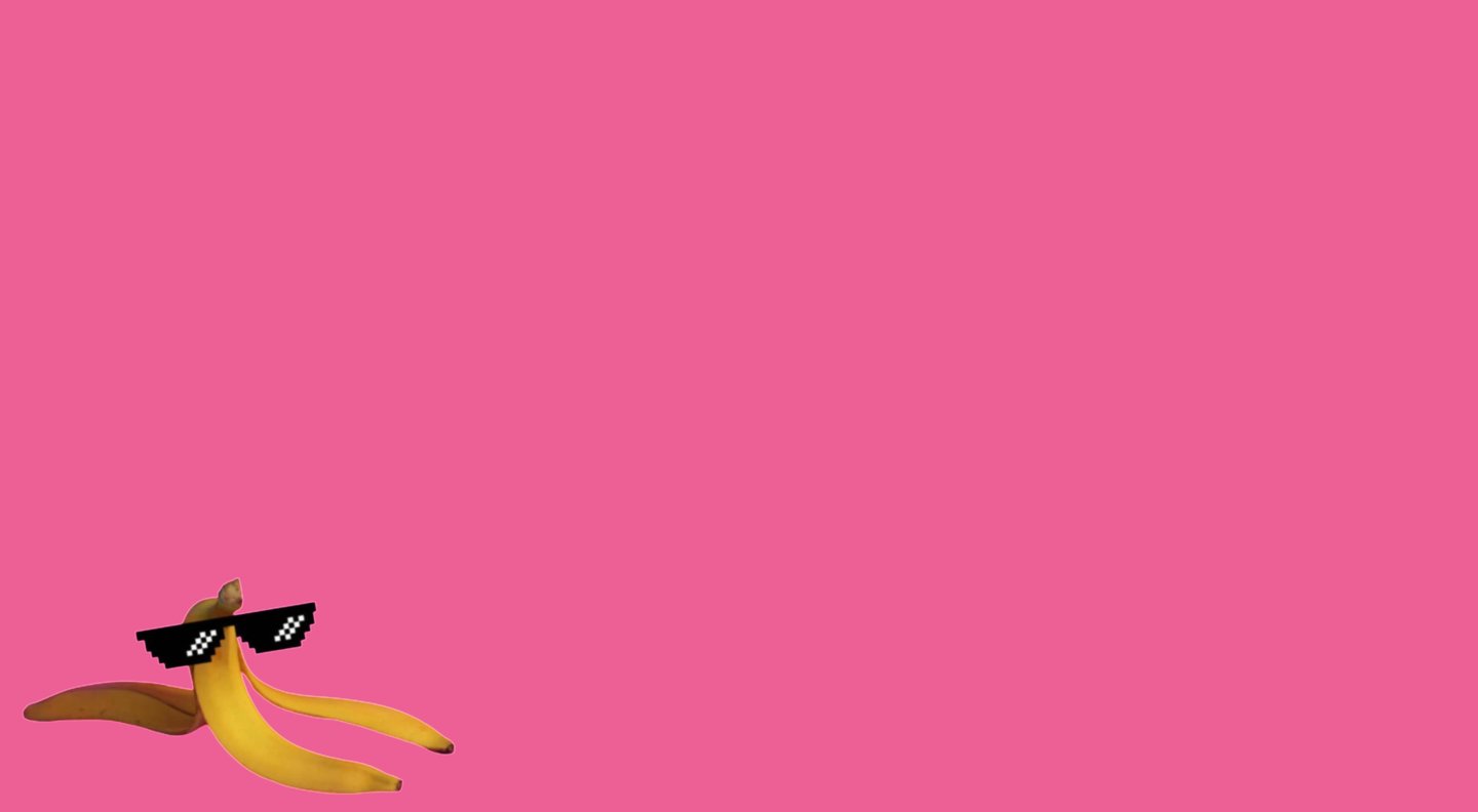 a banana peeler sitting on top of a pink background