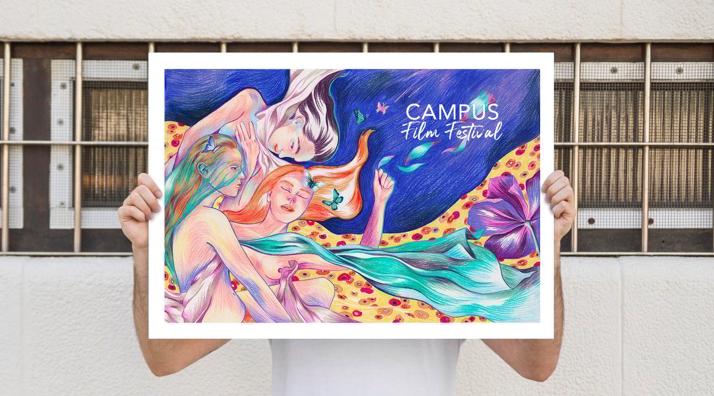 a man holding up a poster of a mermaid tail