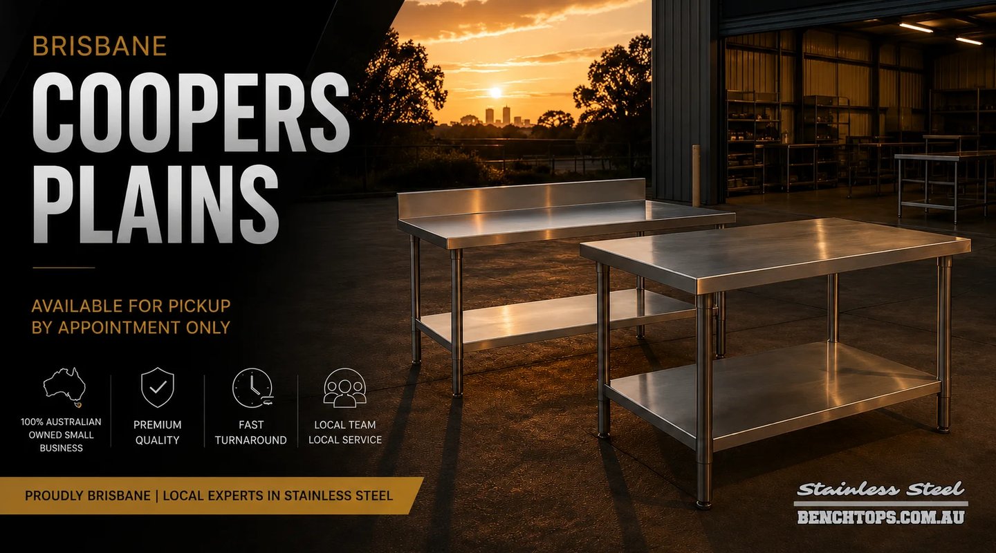 Heavy-duty stainless steel bench Coopers Plains displayed outdoors at sunset.