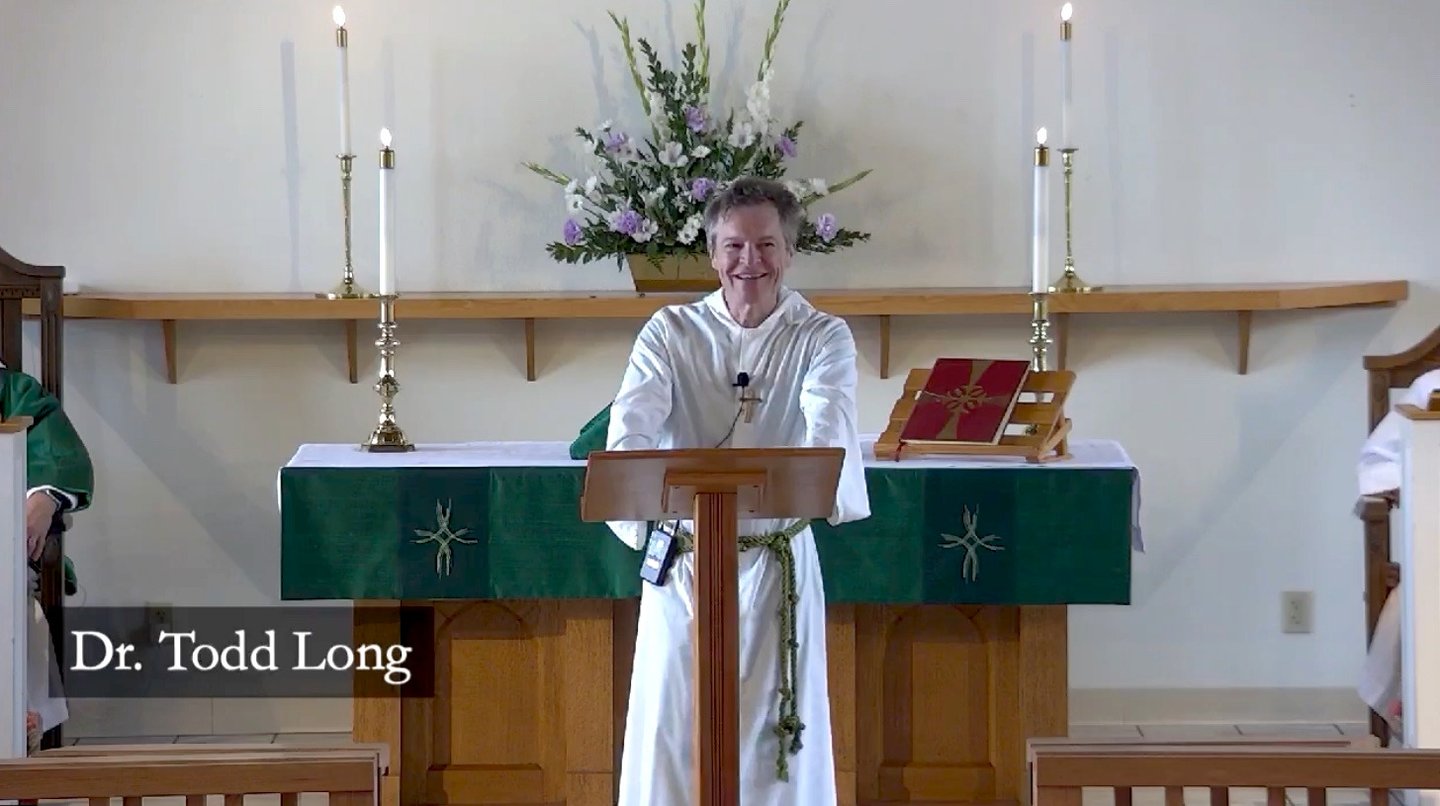 Image of Dr. Todd Long delivering homily