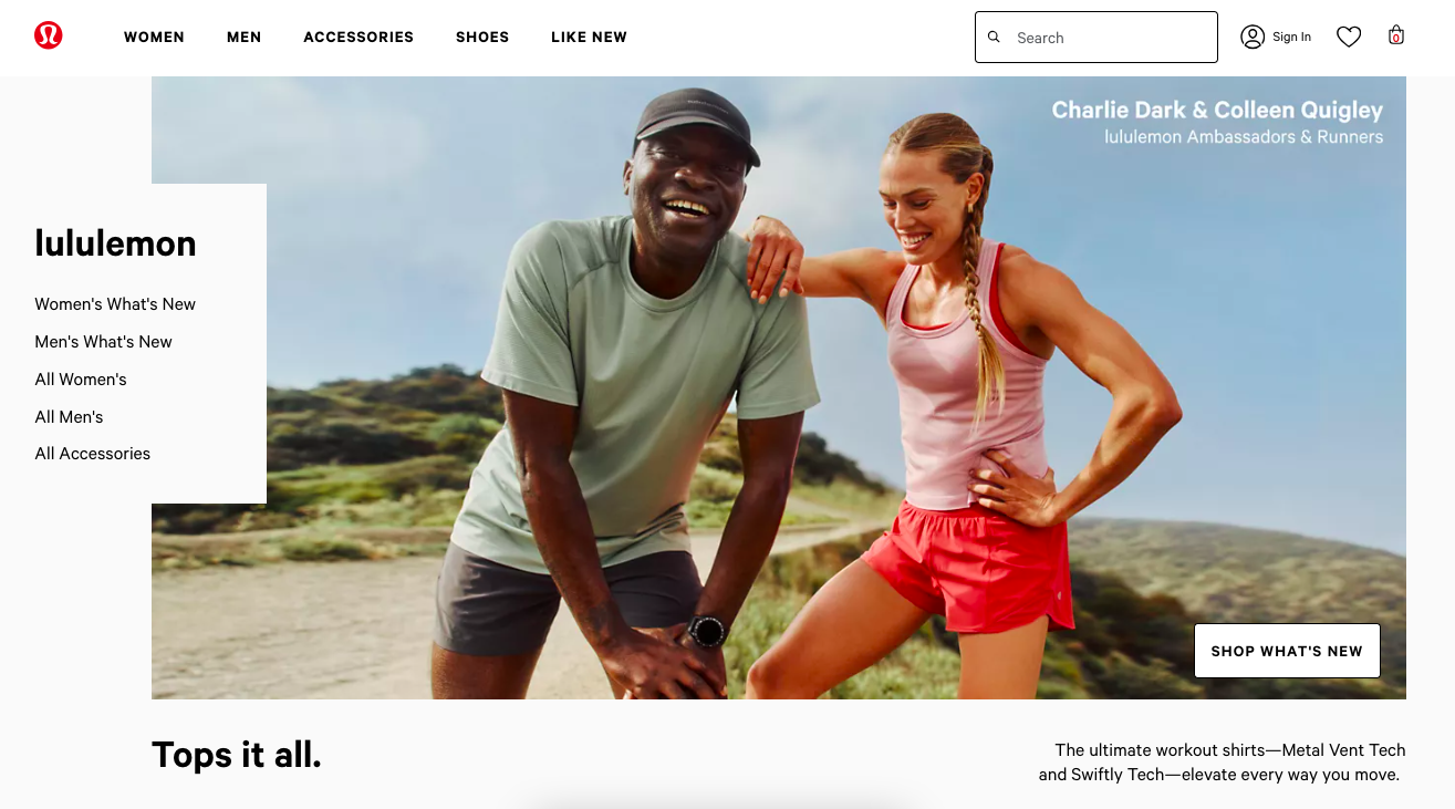 Athletes Charlie Dark and Colleen Quigley relax, smiling, at the top of a hike in LA.