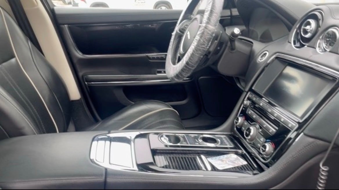 Modern vehicle interior detailing dashboard cleaning Jackson MI