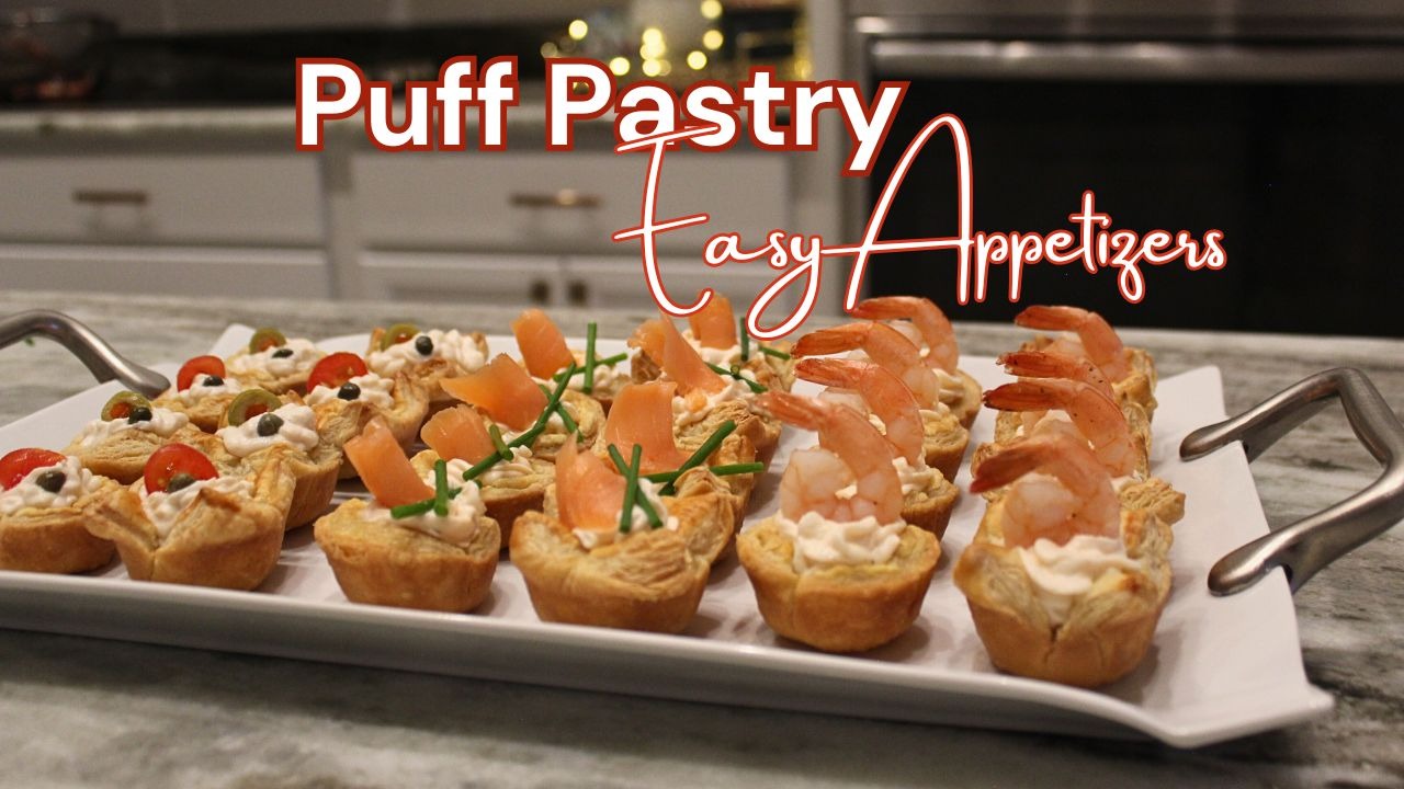 a platter of appetizing food with made with puff pastry and shrimp, chicken and smoke salmon