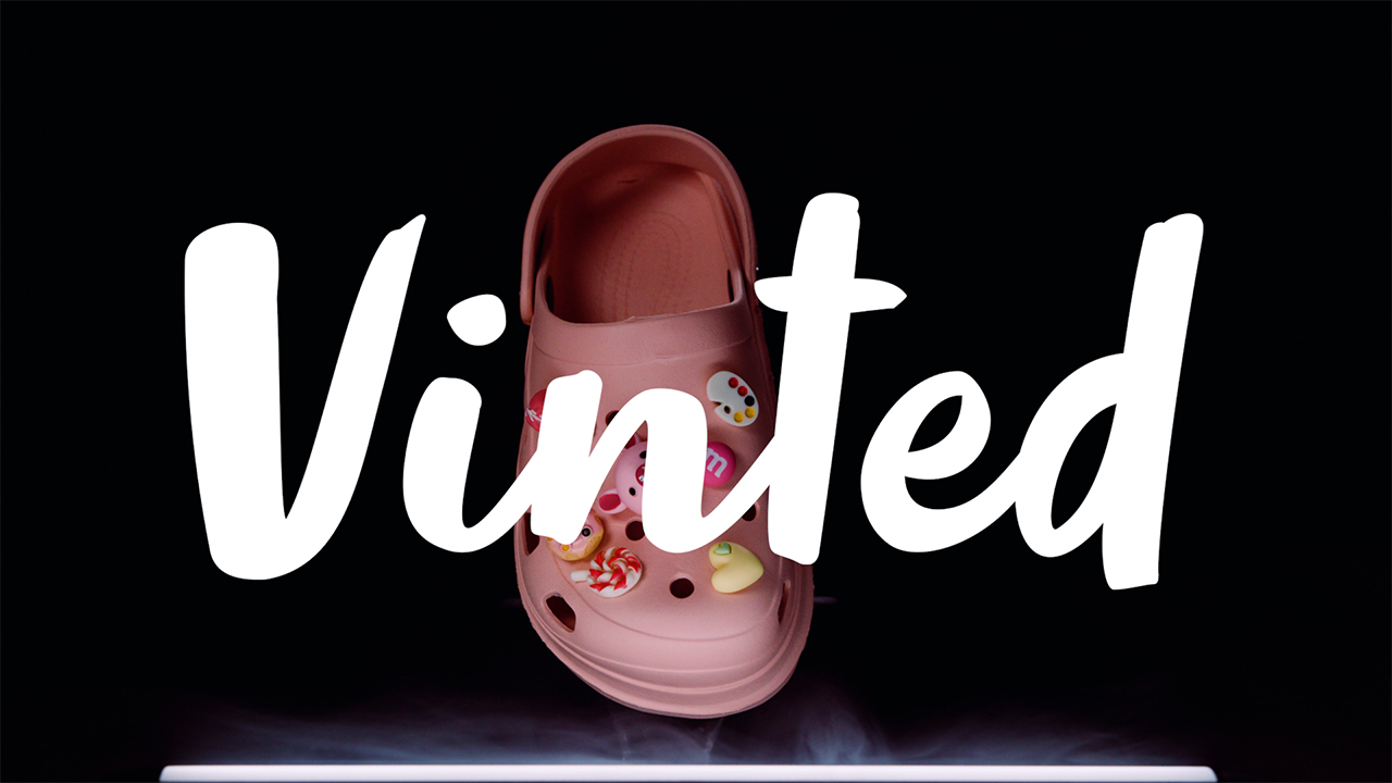 a pair of pink shoes with a pink flowered shoe