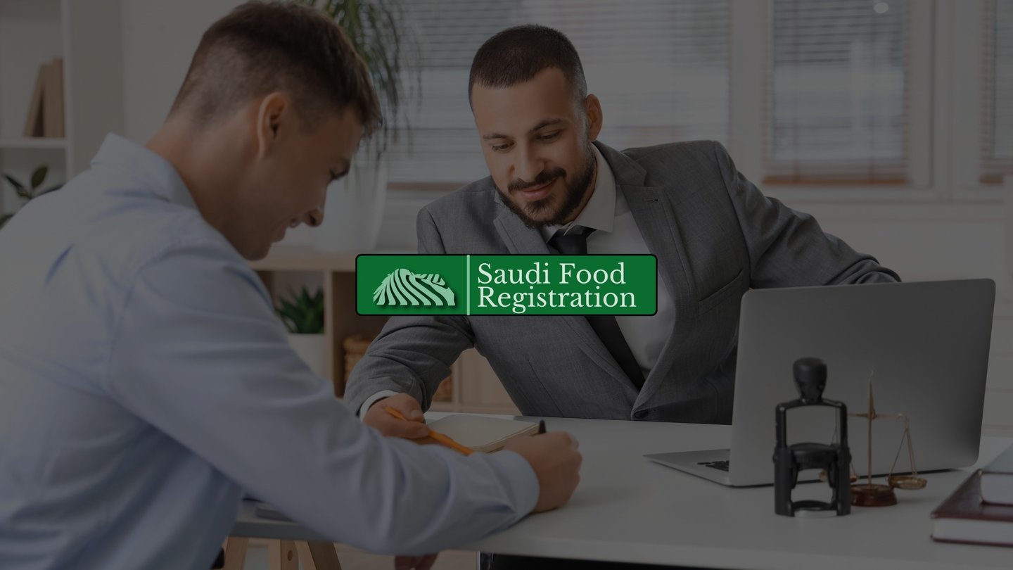 Consultant providing government liaison services for SFDA approvals in Saudi Arabia during an office meeting.