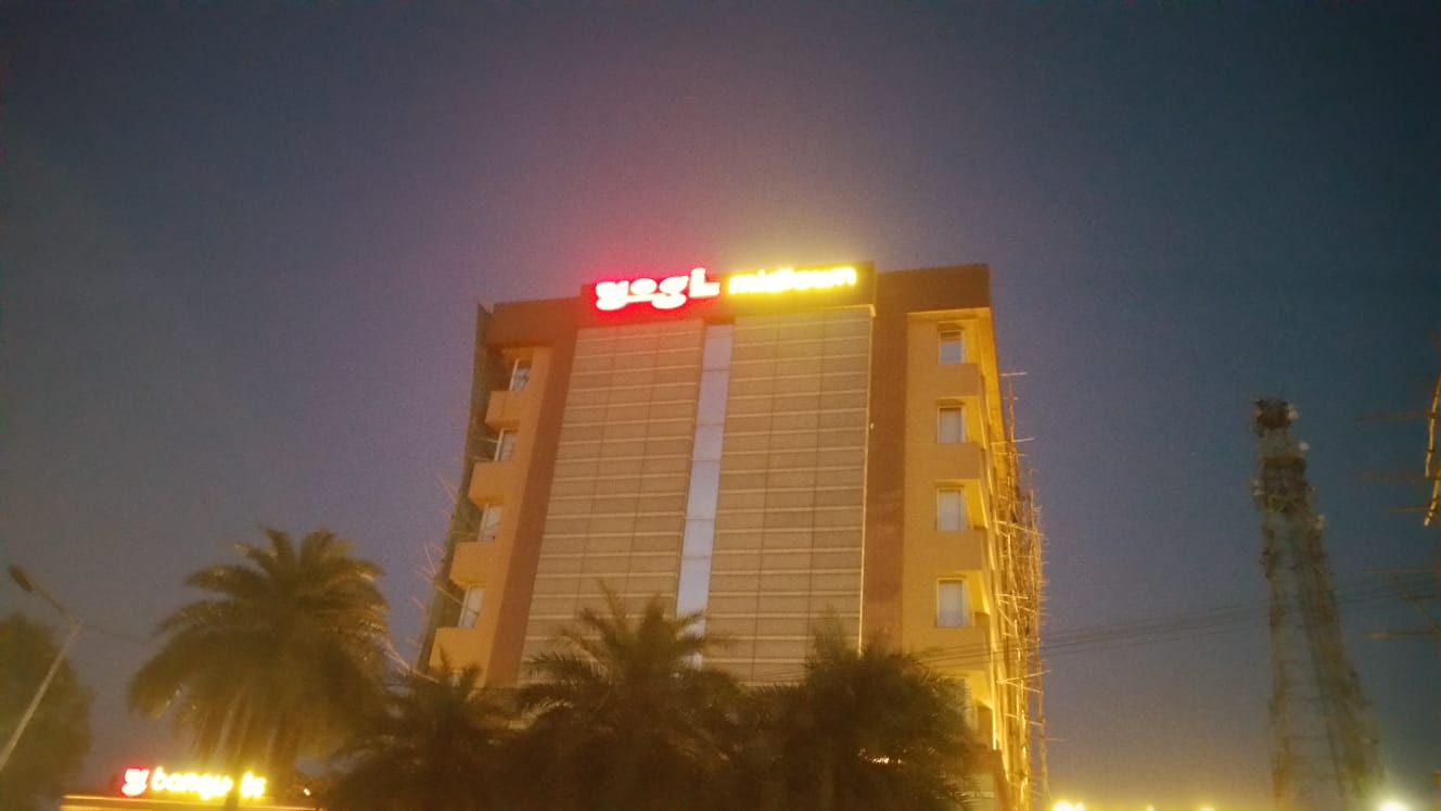 Glow Sign Board on Rooftop