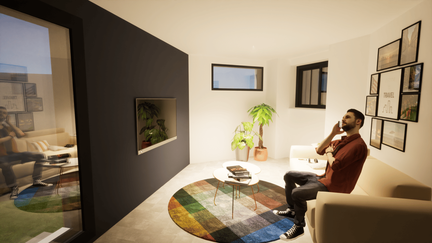 salon canapé homme au téléphone