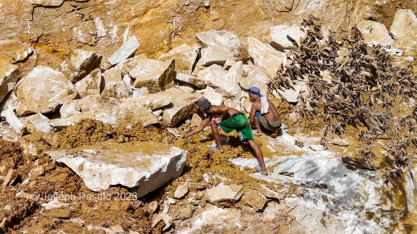 Man Extracting Marbles in Quarry Site