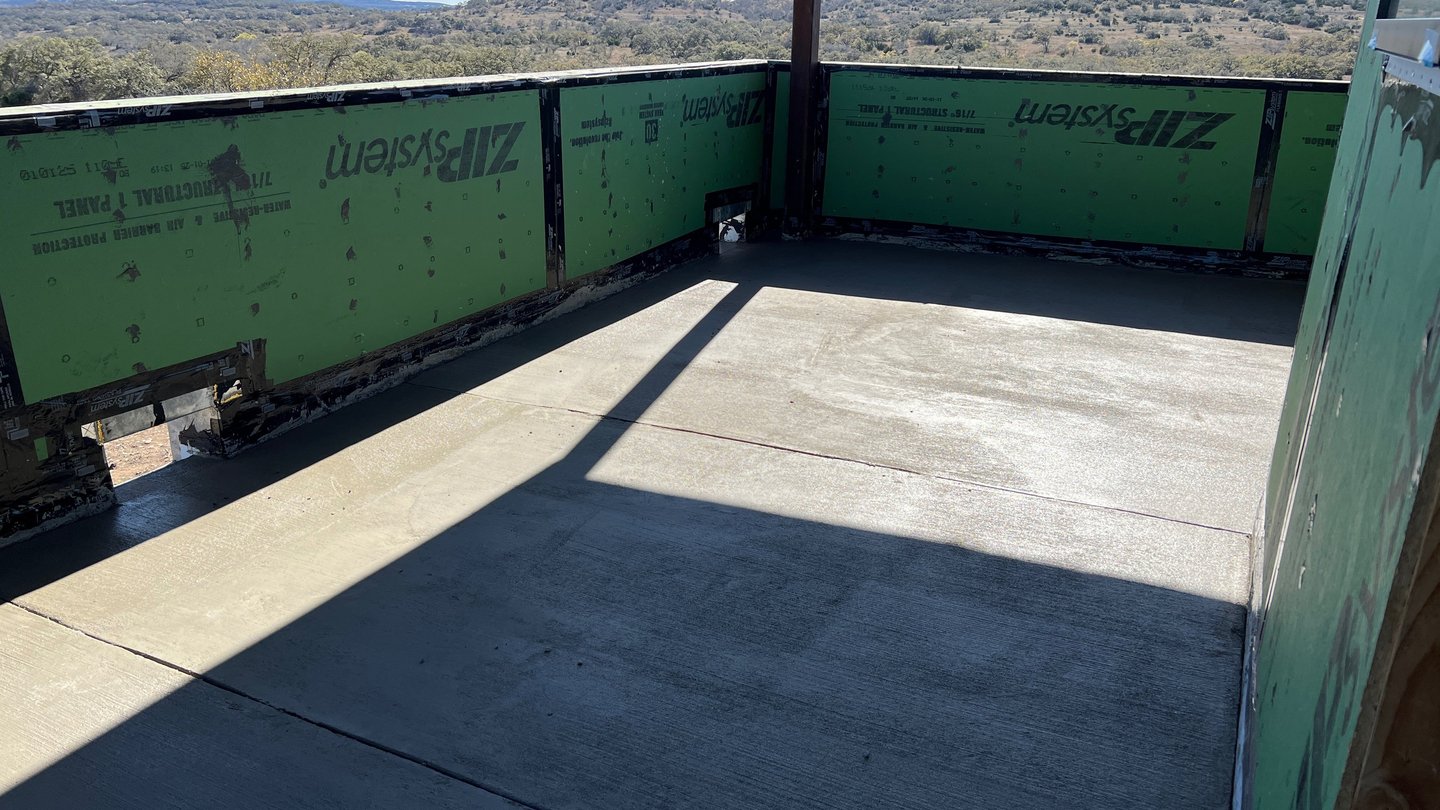 Balcony with poured concrete after being waterproofed.