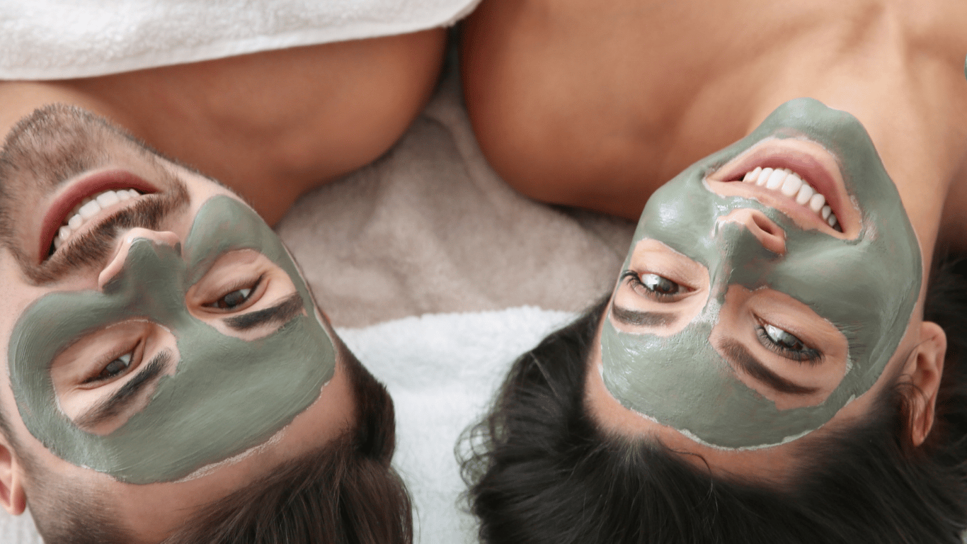 couple with facial mask treatment