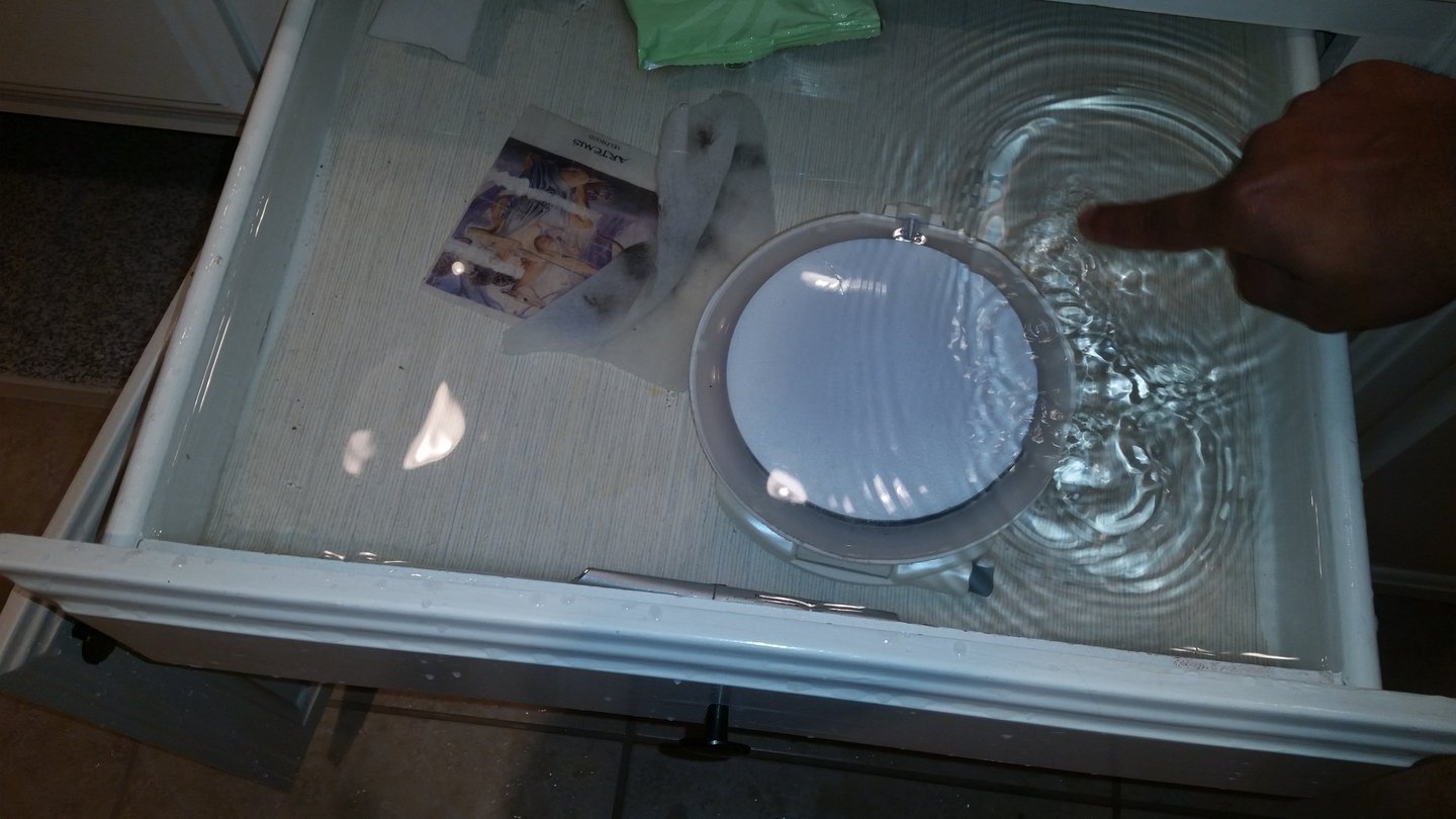 water-damage-restoration-in-pflugerville-kitchen-flooded-with-water