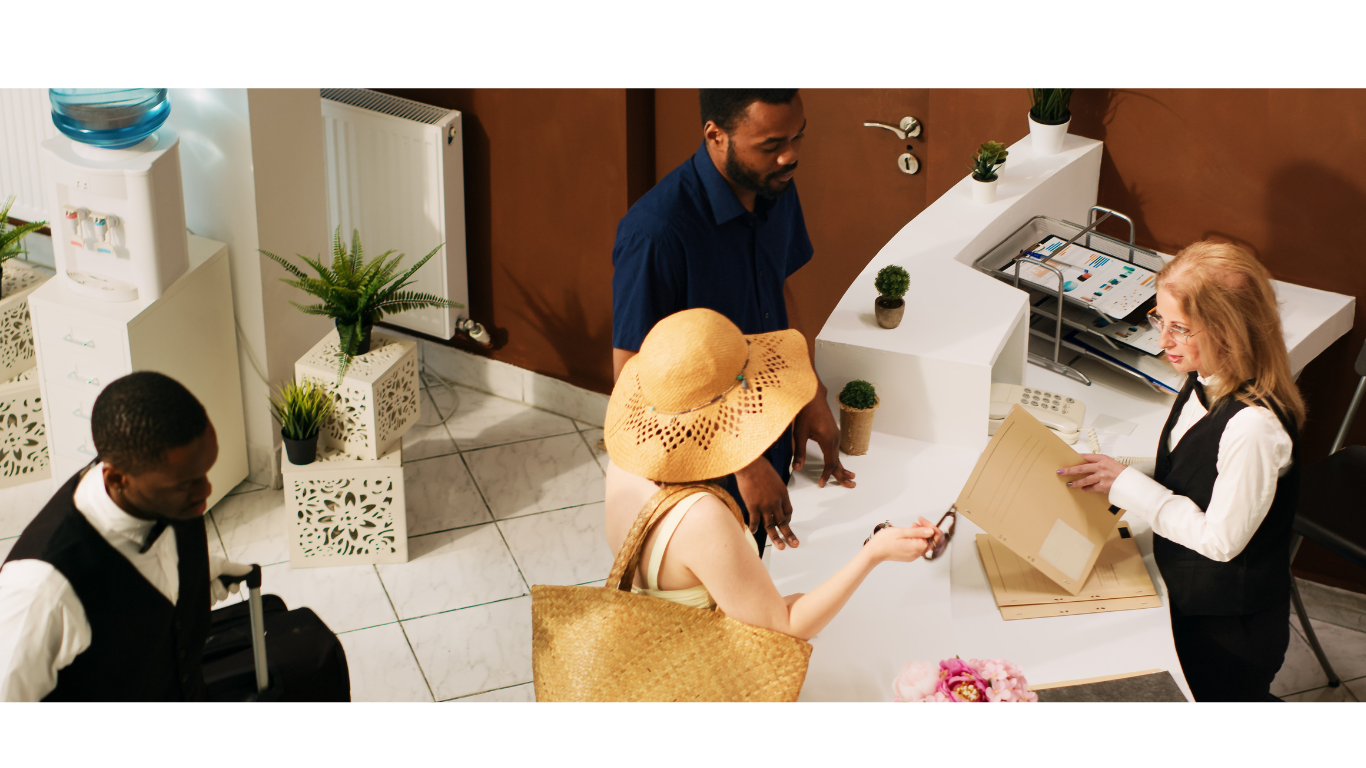 a woman in a hat and a man in a suit and tie