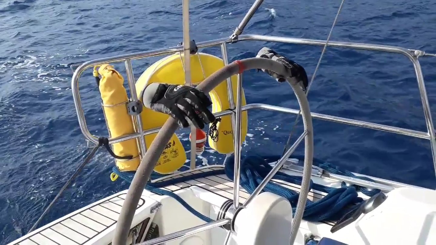 a boat steered by gloves. Copyright Vincent Volpe