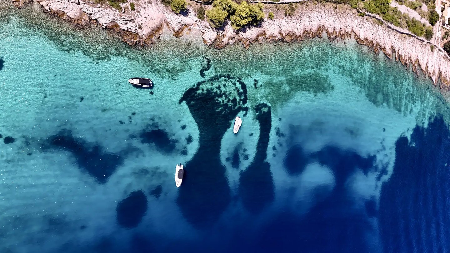 Aerial panoramic view of Drvenik Mali Island, seen on a private boat tour off the coast of Split, Croatia.