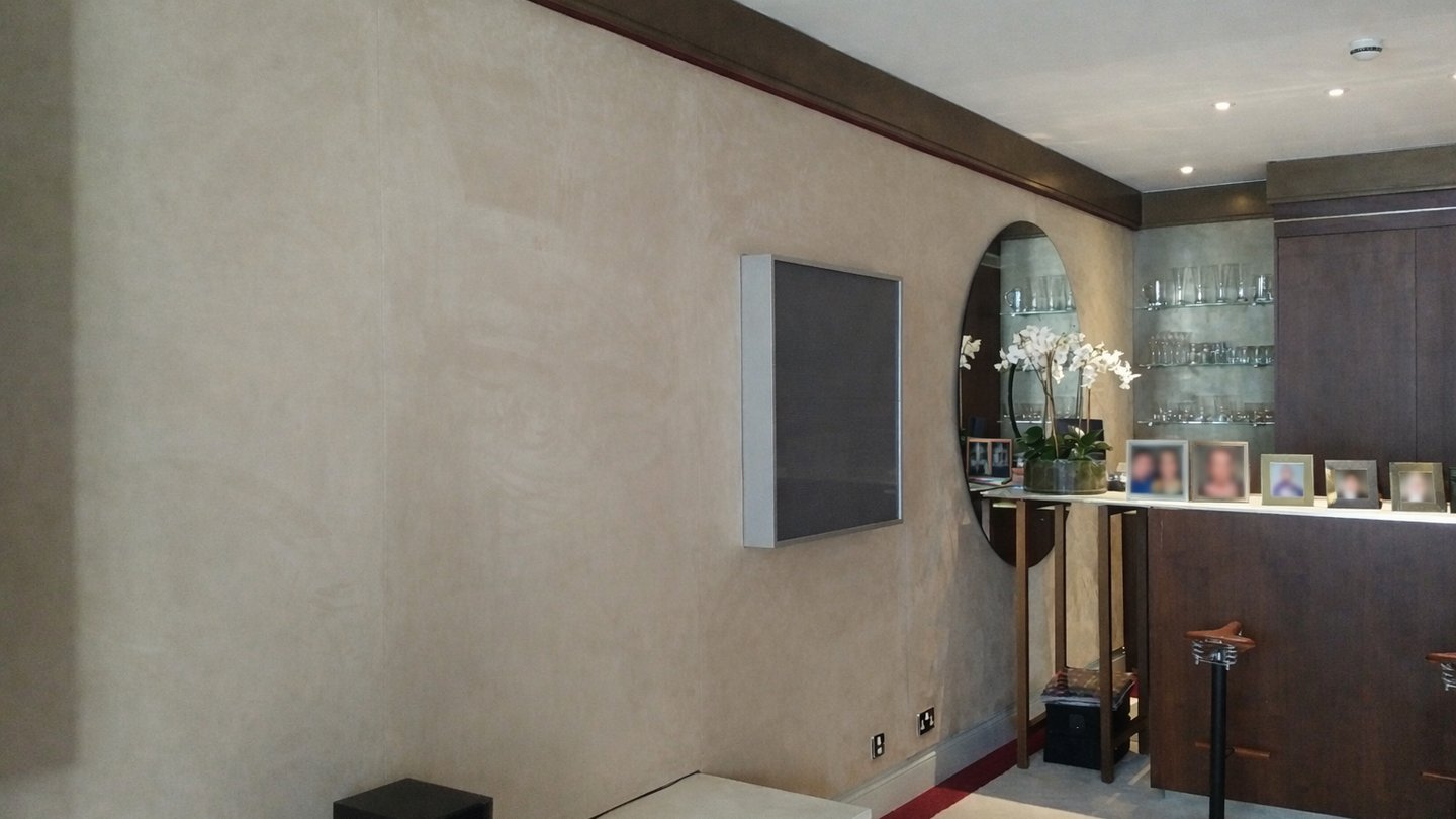 Neutral fabric wall finish in a residential living room