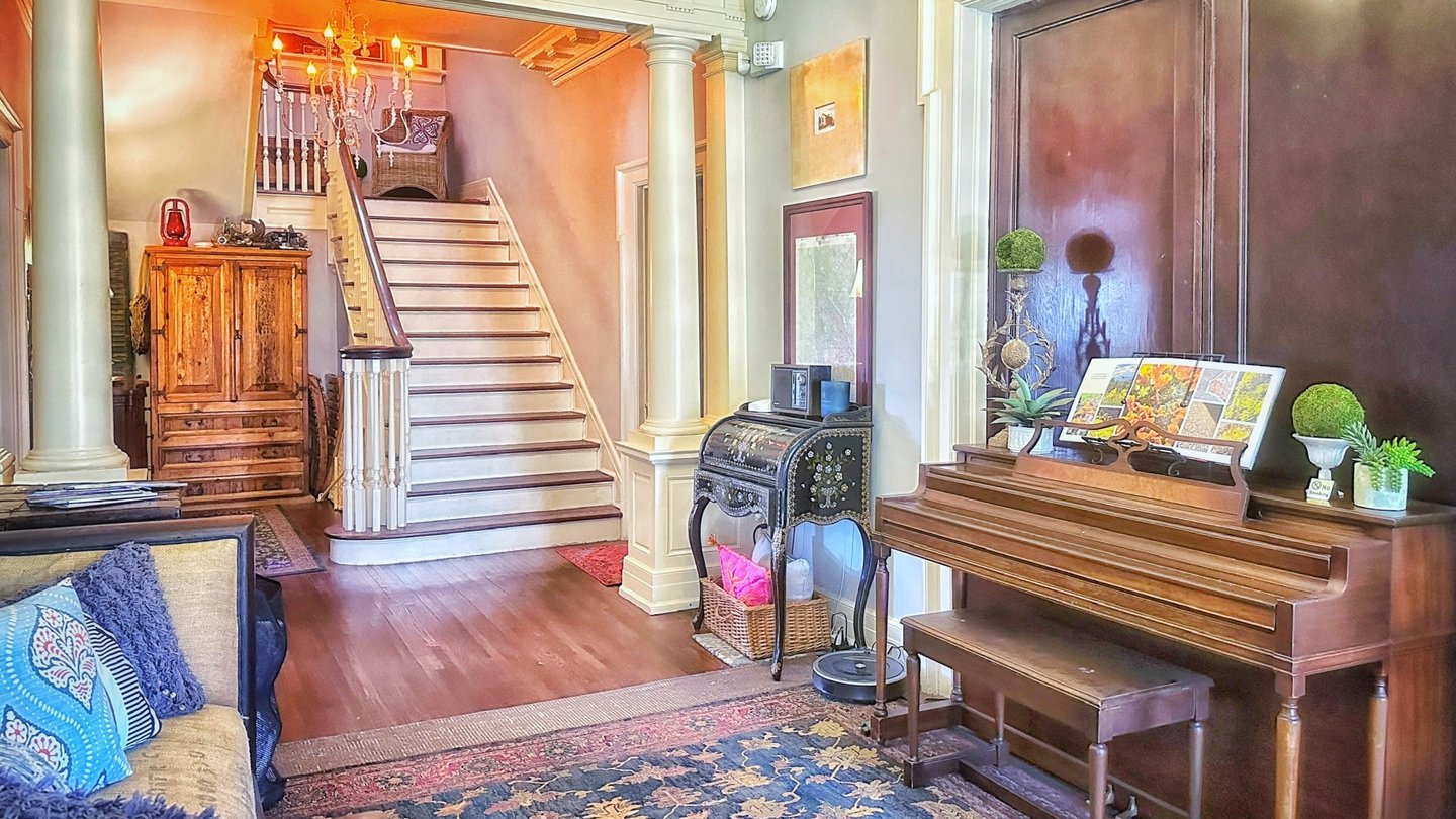 foyer and grand staircase 2123 rivermont apartments
