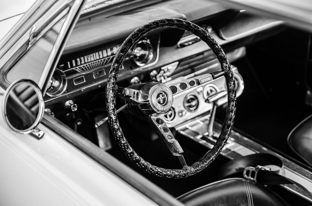a steering wheel and steering wheel of a ford Mustang