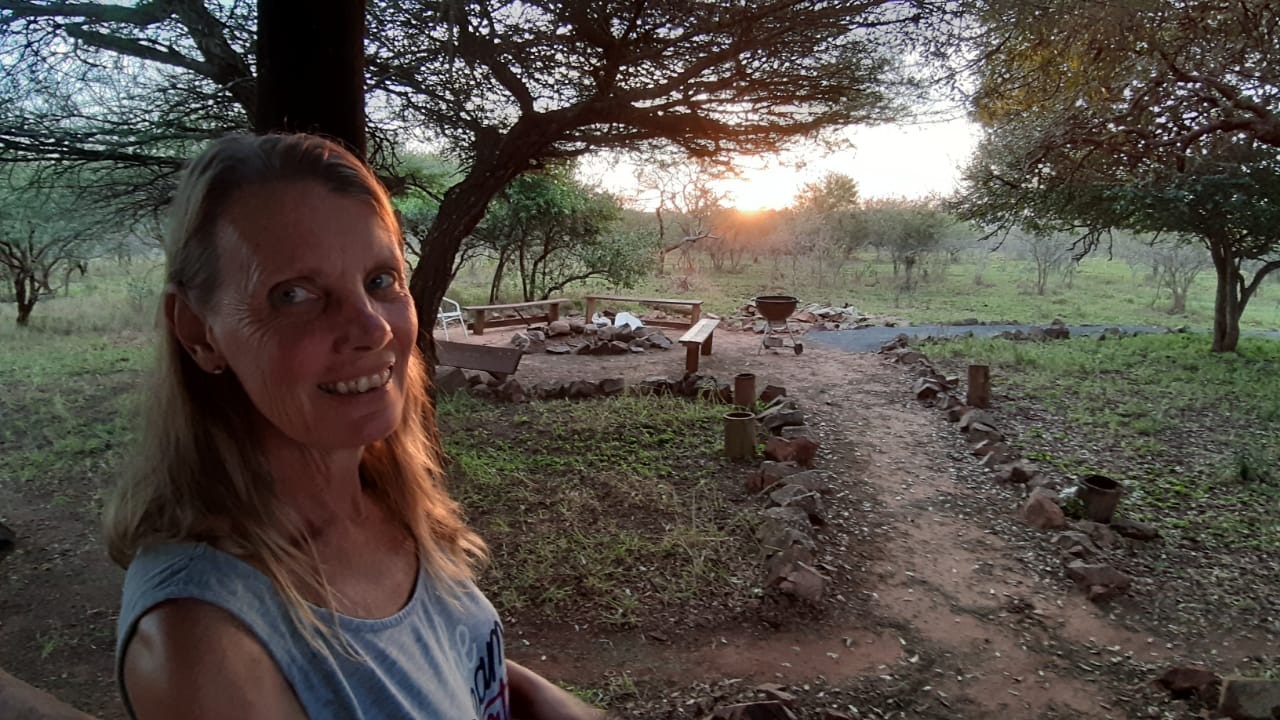 Fire pit area next to communal kitchen for the affordable glamping dome tent accommodation in Hluhluwe