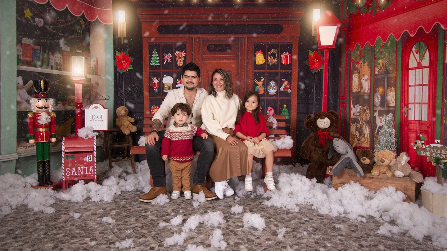 a family posing for a photo in a christmas card