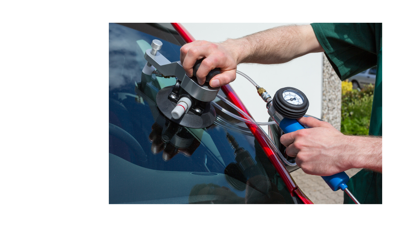 a man is holding a hose and a hose in his hand