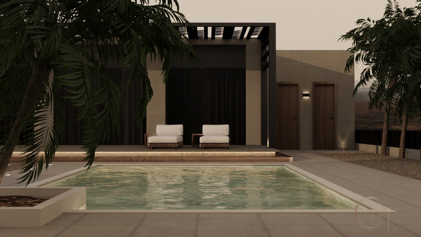 a pool with a lounge chair in a villa.