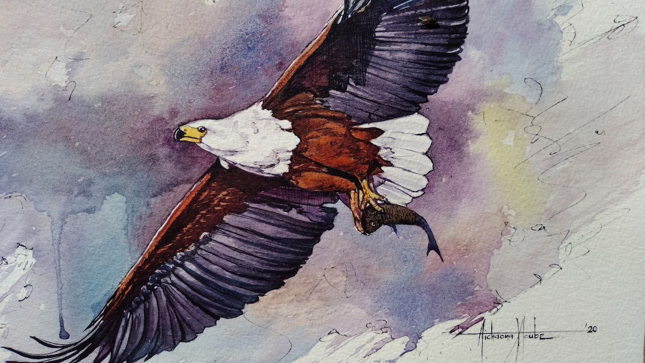 a bird flying through the air with a bird in the background