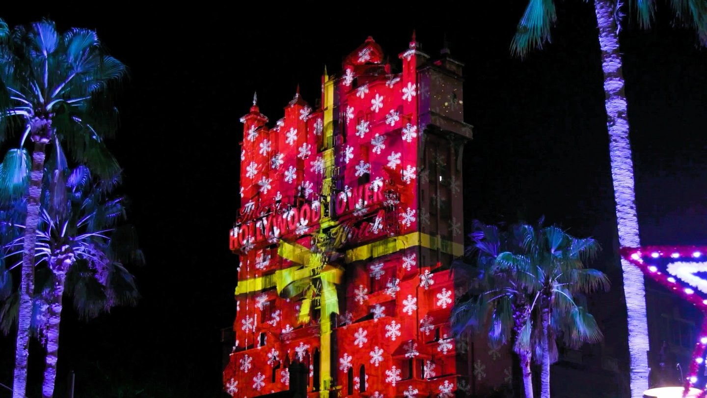 Sunset Seasons Greetings (Hollywood Studios) - Hollywood Tower Tower Hotel with Holiday gift wrap overlay