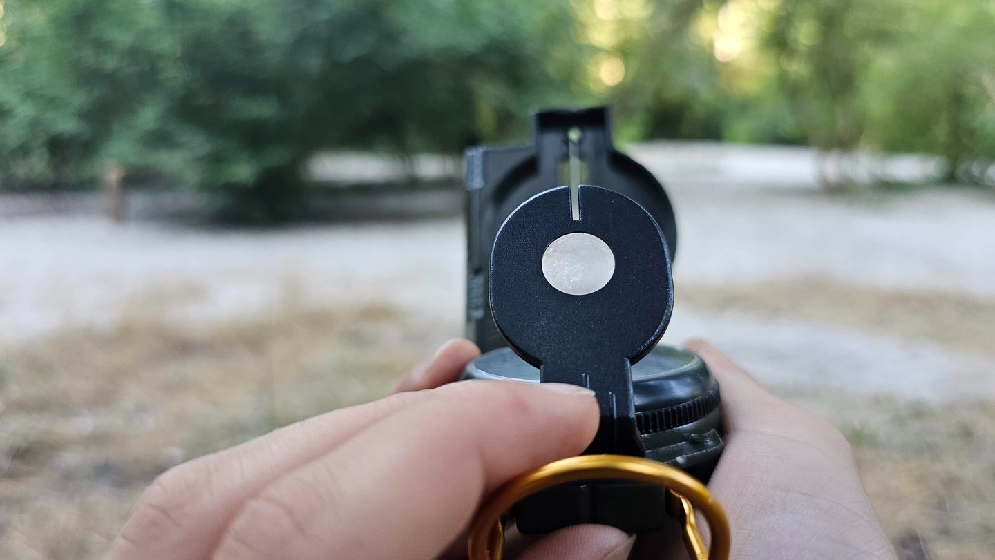 a person holding a compass