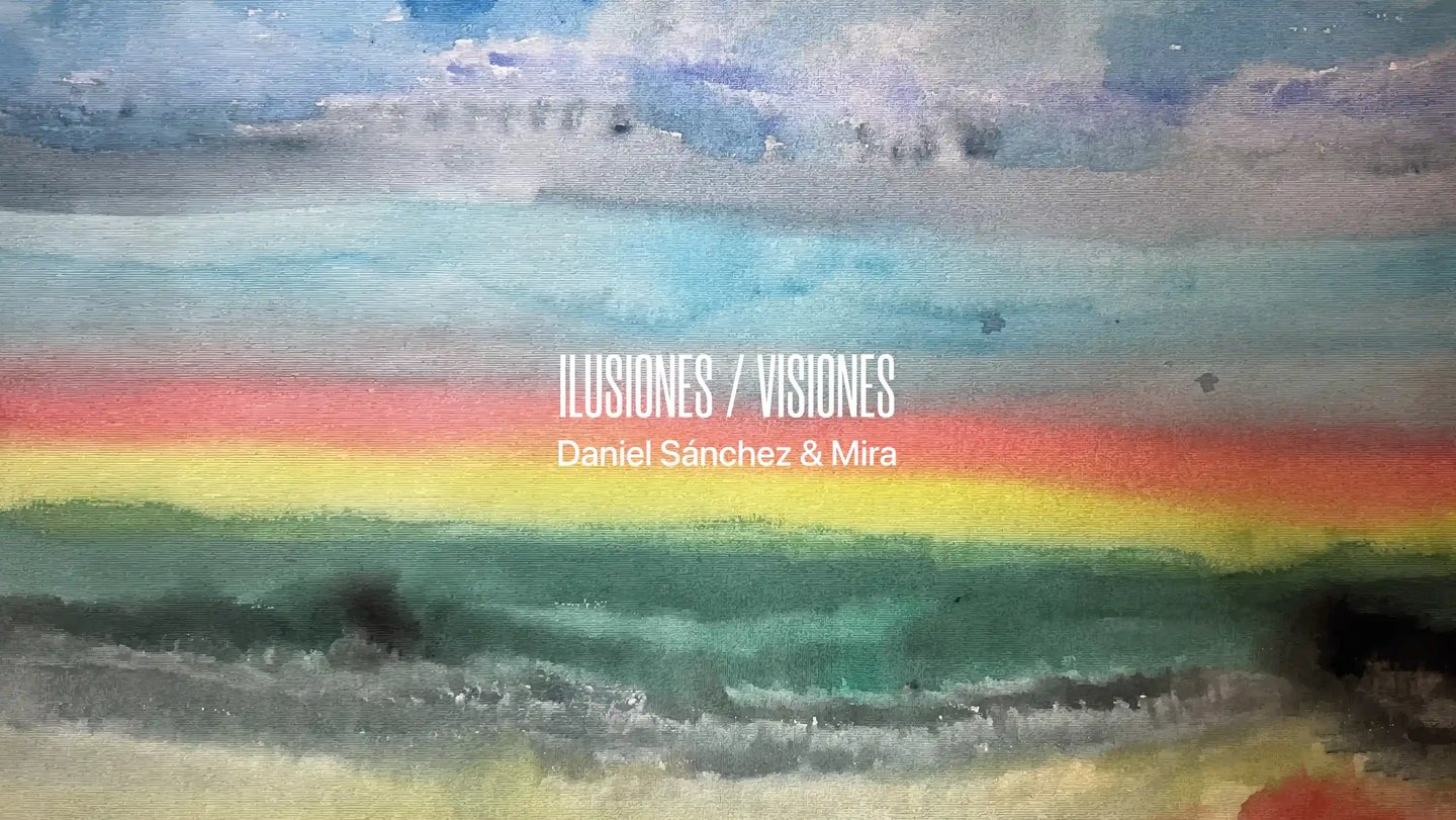 Portada del disco Ilusiones/Visiones sobre fondo multicolor