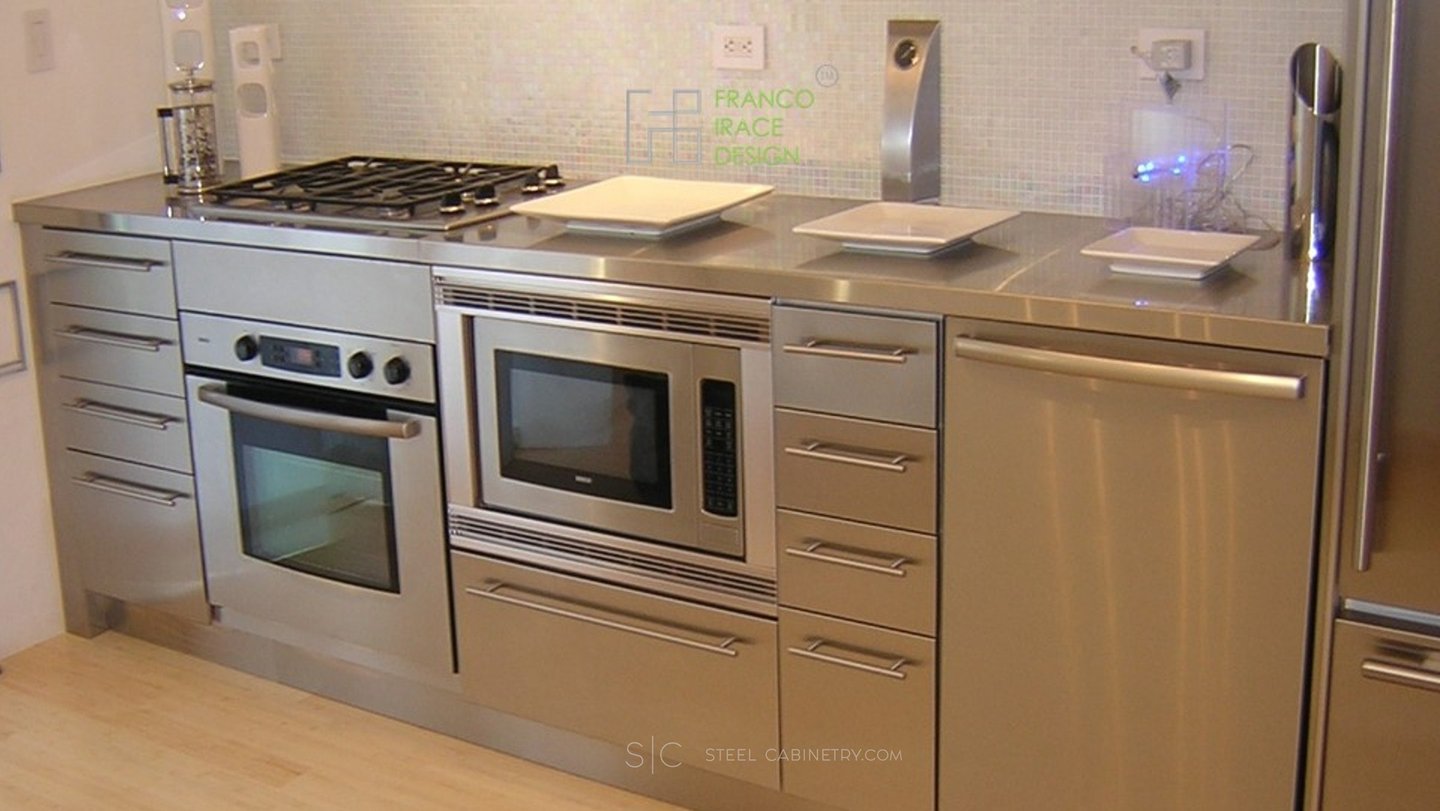Architectural stainless steel kitchen cabinets with built-in appliances and modern design