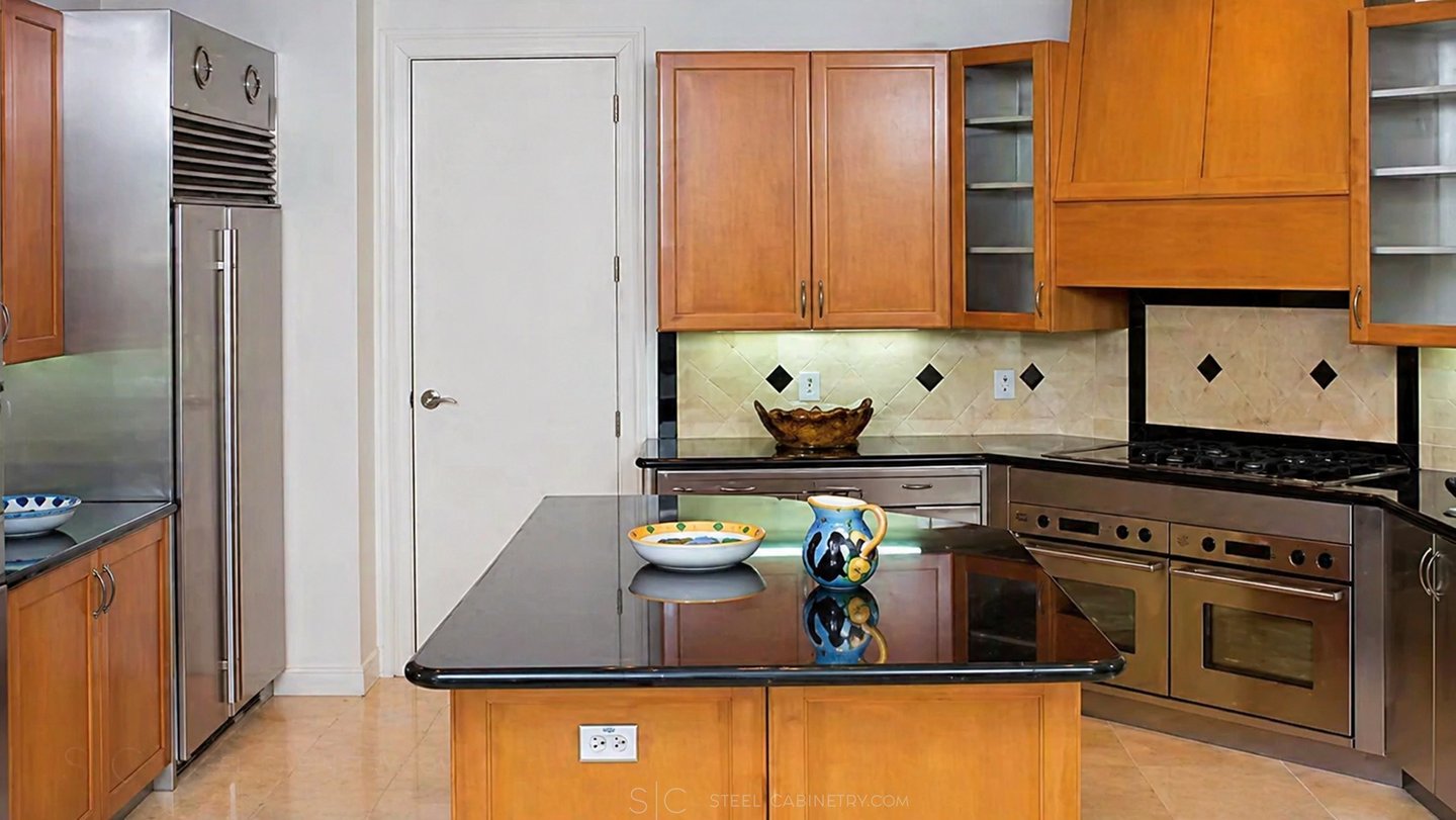 stainless steel interior and wood fronts under black counter top