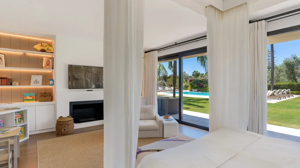 suite with terrace access and pool views at Villa El Olivo, Marbella