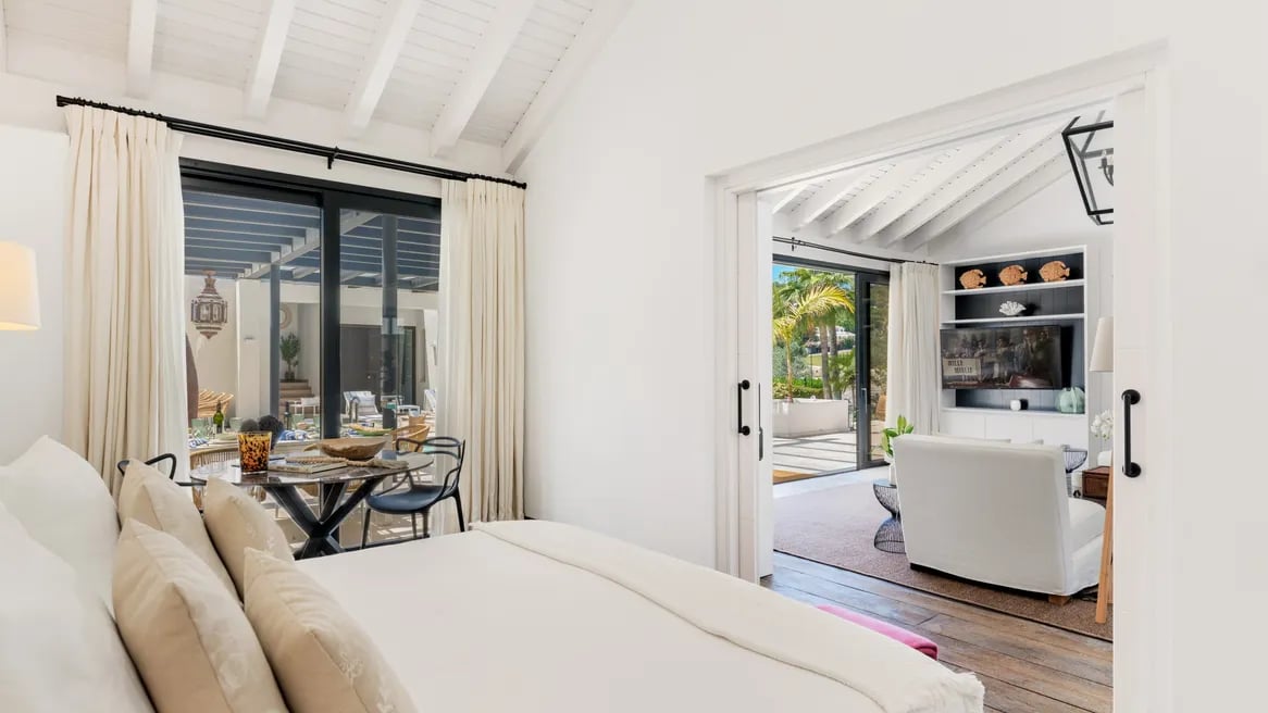 Bright bedroom with terrace access and pool views at Villa El Olivo, Marbella