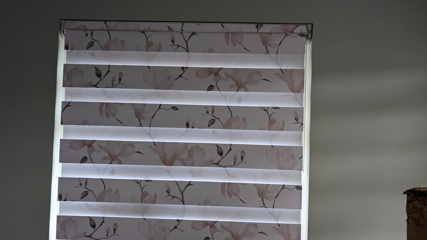 Floral patterned day and night blinds fitted in Aberdeen window