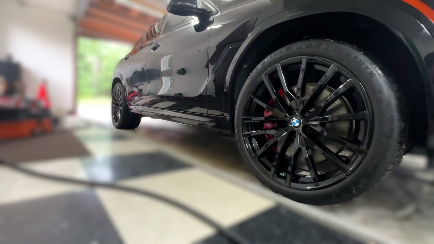 ceramic coating of paint and rims on a black bmw