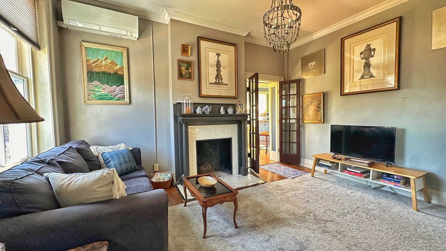 living room with couch and fireplace 2123 rivermont apartments