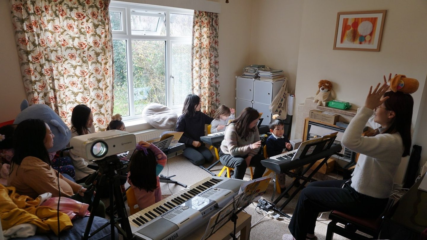 Photo1 – student participating in music lesson
