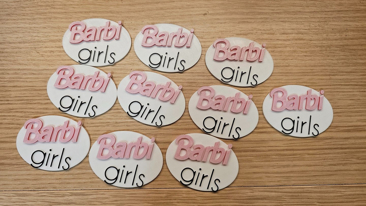 a number of baby shower signs on a table