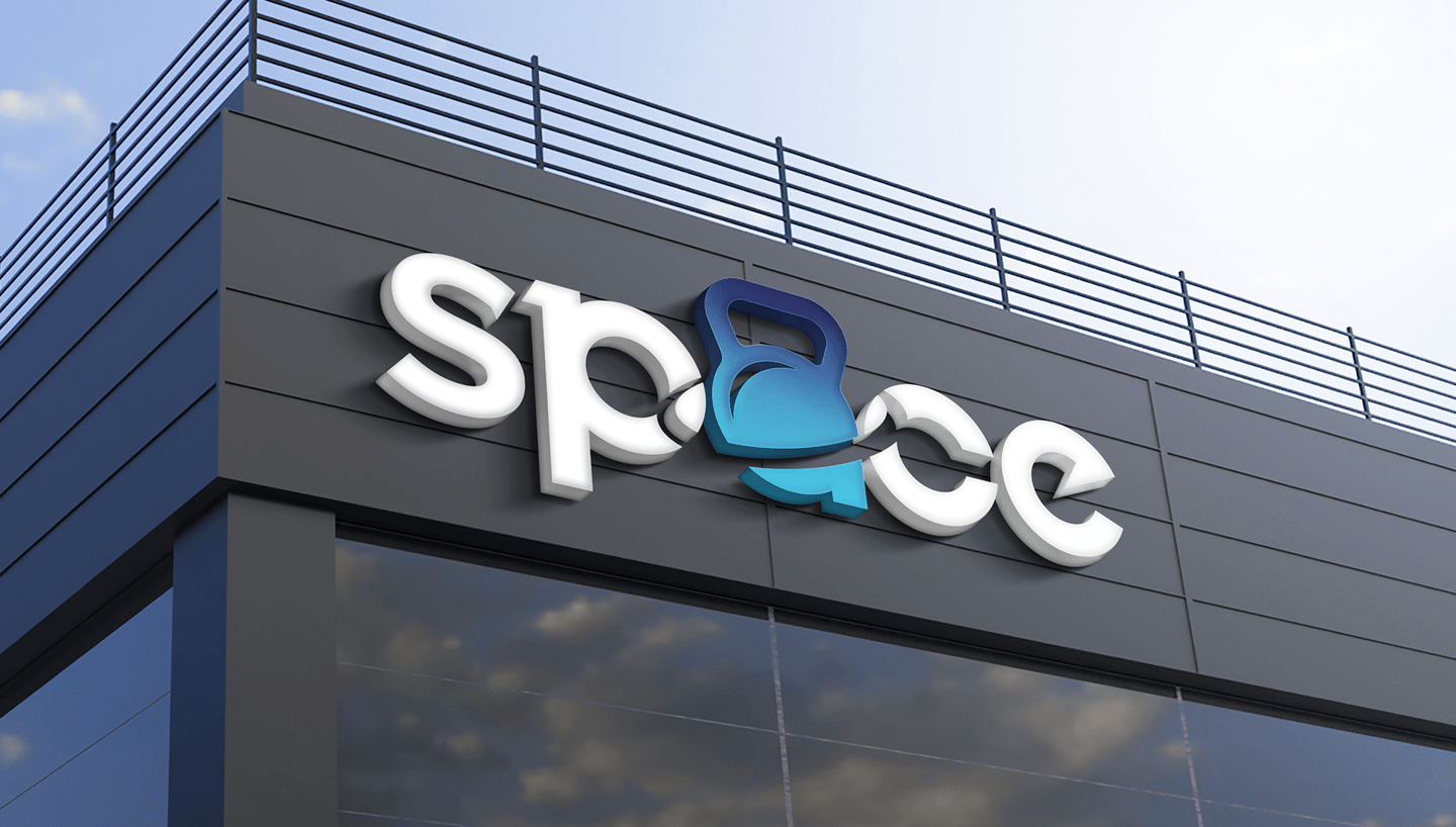 facade of a business building with the application of the space crosstraining logo on a luminous sig