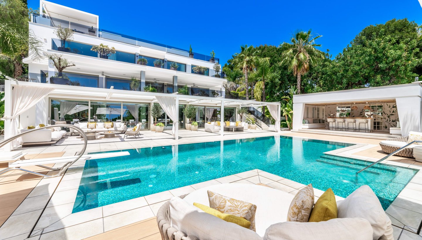 Panoramic view of Villa Serenity showcasing the pool area and surrounding outdoor spaces